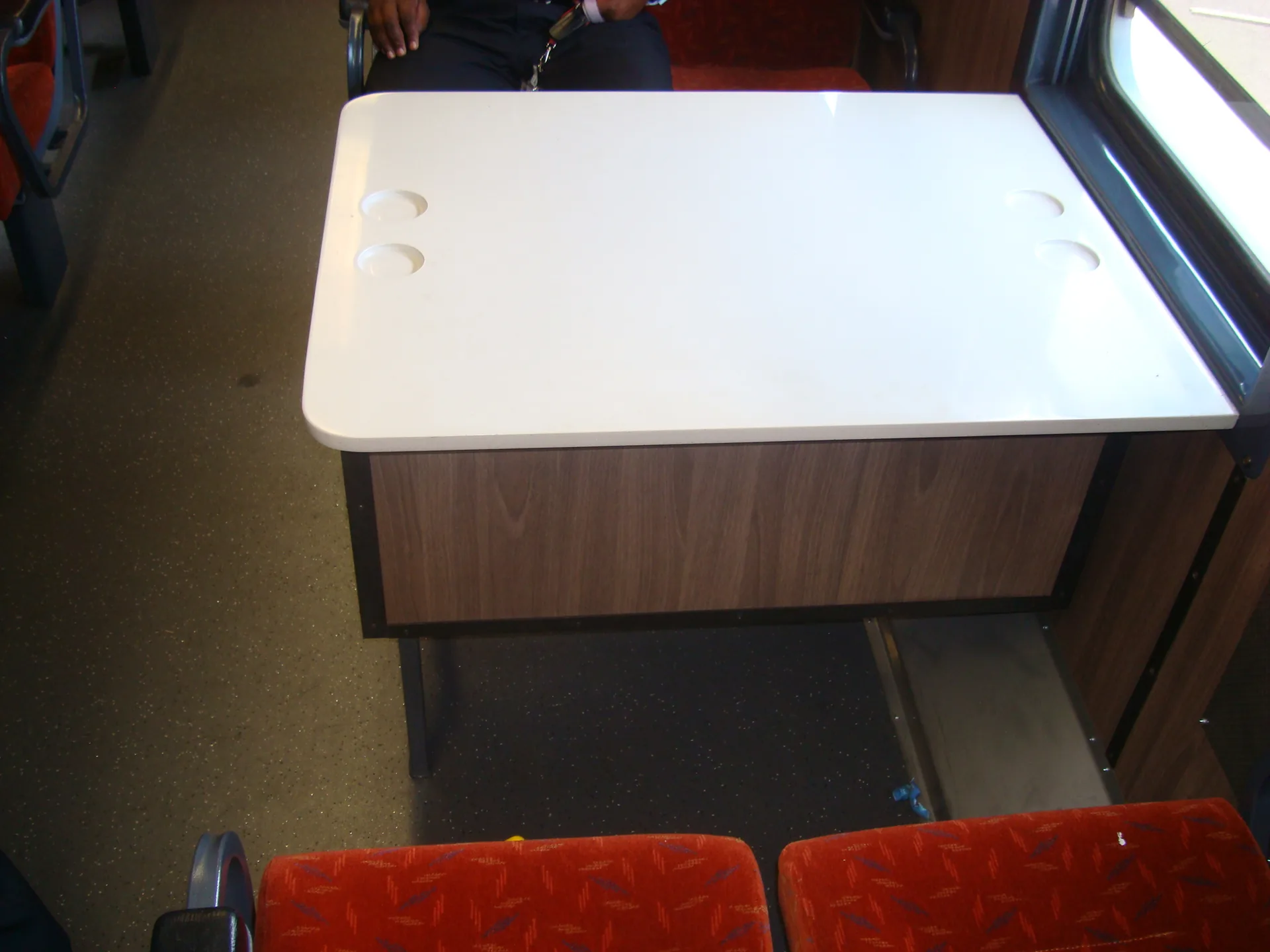 Dining table cupholders